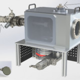 Configurable irradiation chamber with high power Faraday cup (top right corner), manipulator stage (bottom left corner), gate valve, turbo pump and preparation for sample handler.