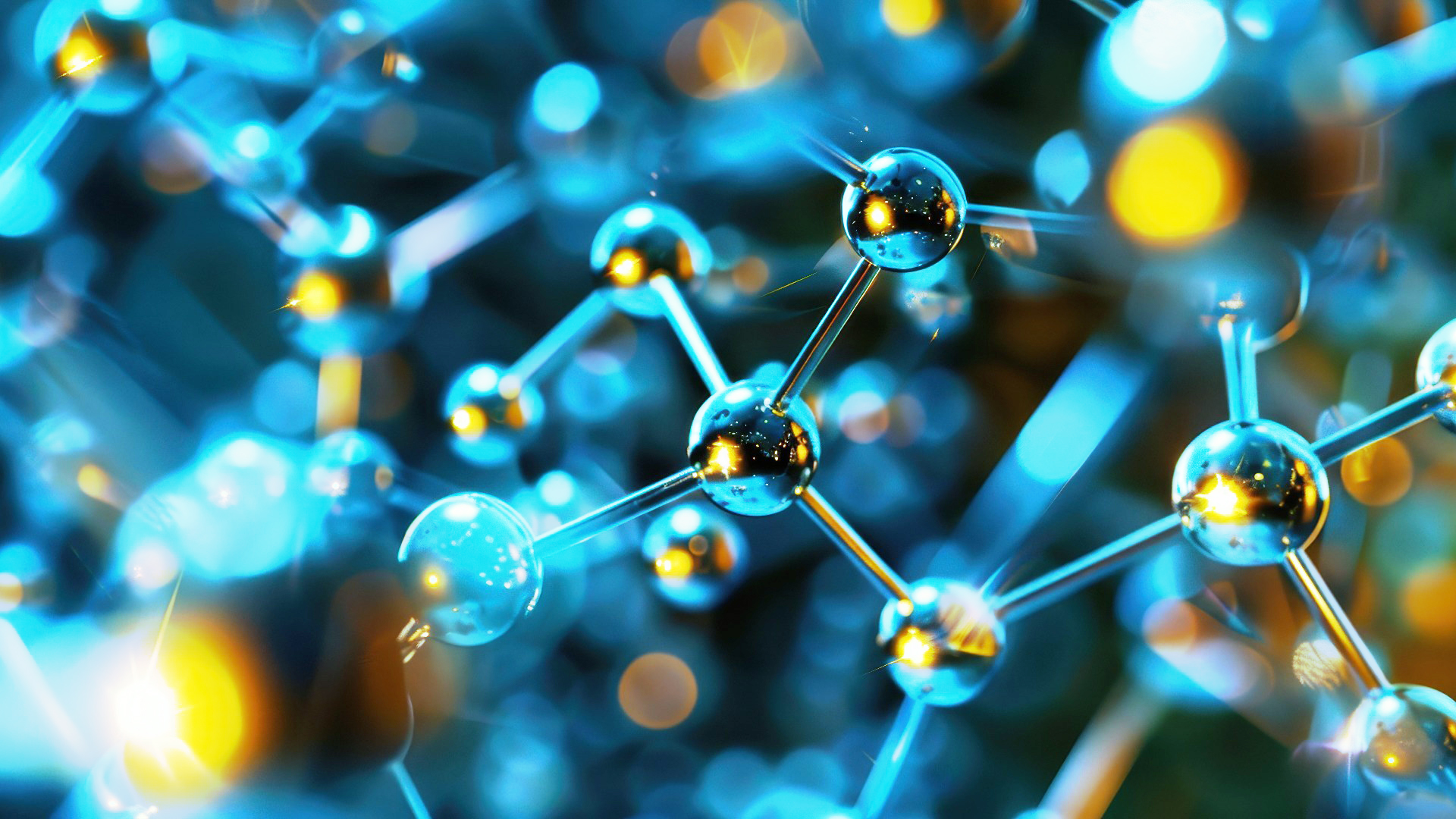 Nahaufnahme eines leuchtend blauen chemischen Modells mit metallischen Kugeln